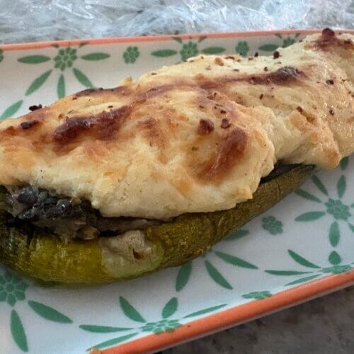 Courgettes gratinées aux champignons